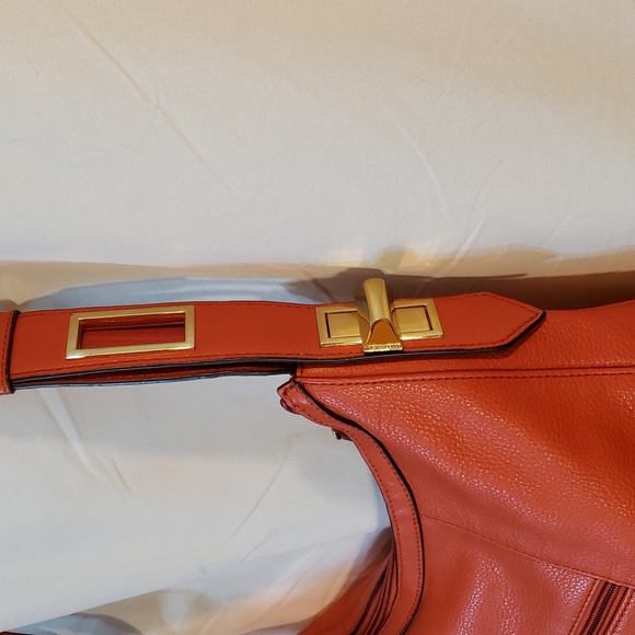 Orange leather Tignanello 12" X 9" purse with 18" adjustable strap (c1) - Picture 3 of 14